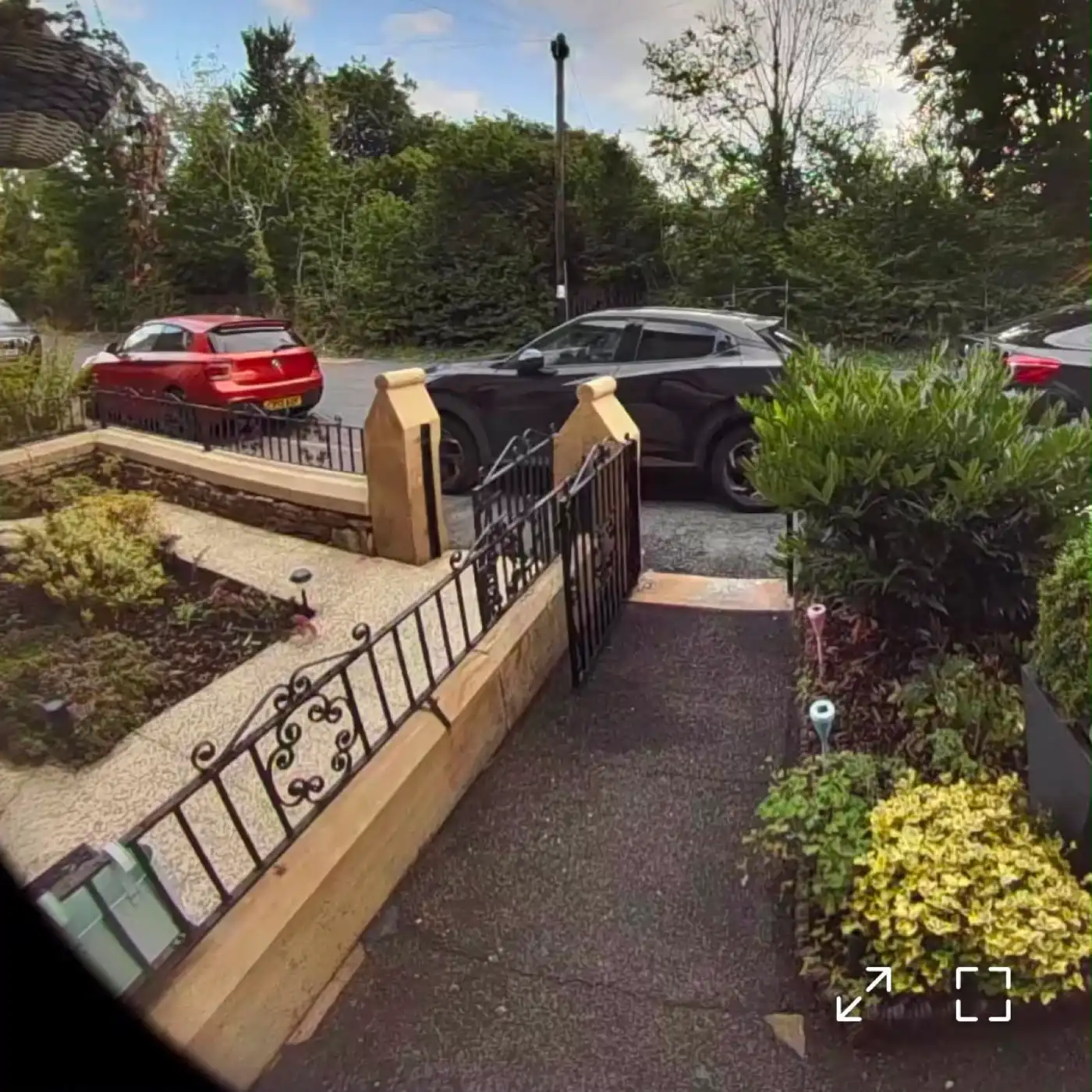 A cleaned path and wall at a terraced house