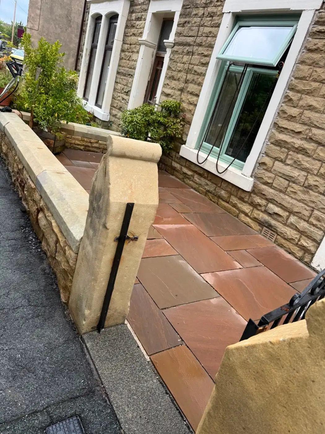 A finished driveway job with the surface cleaner still in place