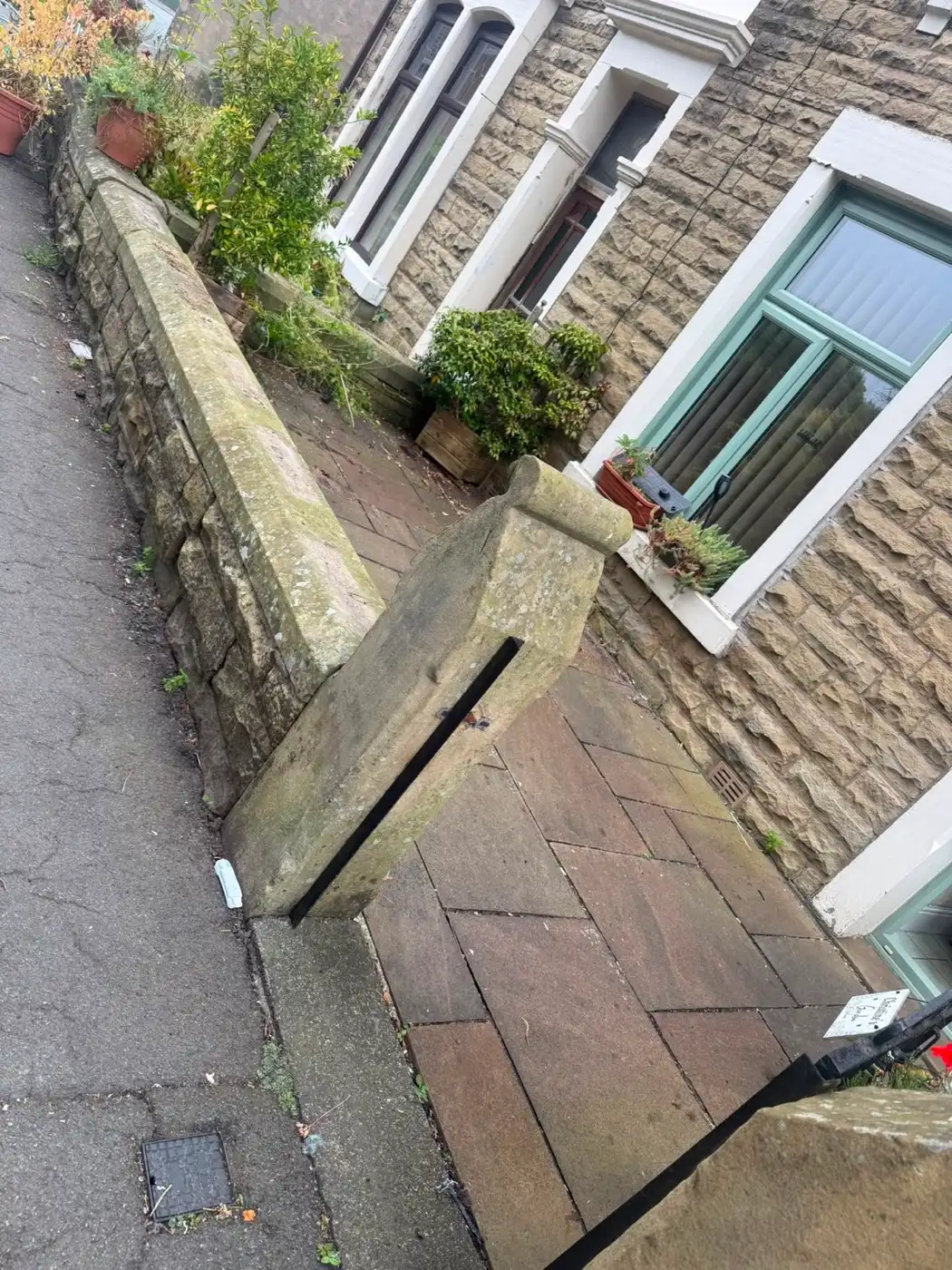 The completed job with the JT Cleaning pavement sign at the kerbside
